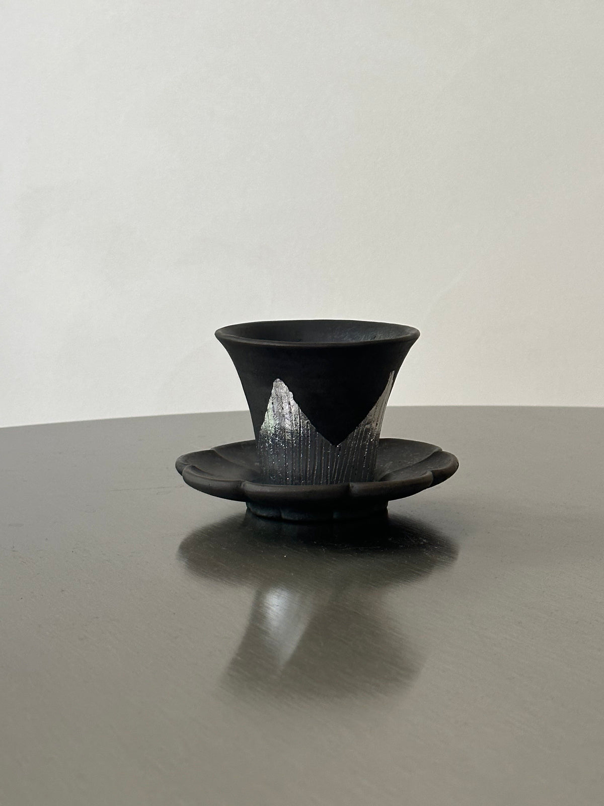 Many black pottery handmade silver-leaf snow mountain cups