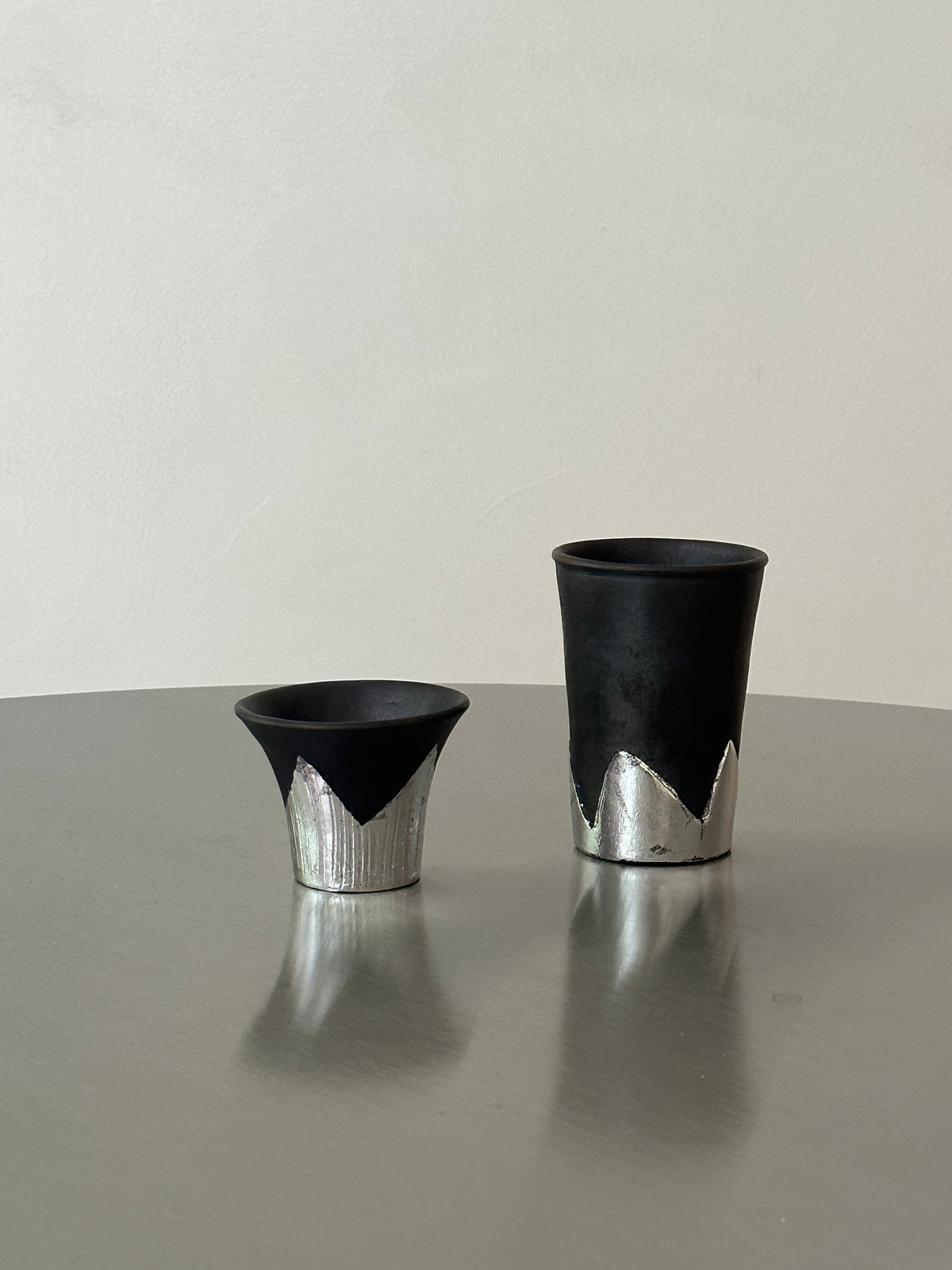 Many black pottery handmade silver-leaf snow mountain cups