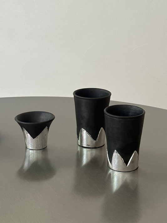 Many black pottery handmade silver-leaf snow mountain cups