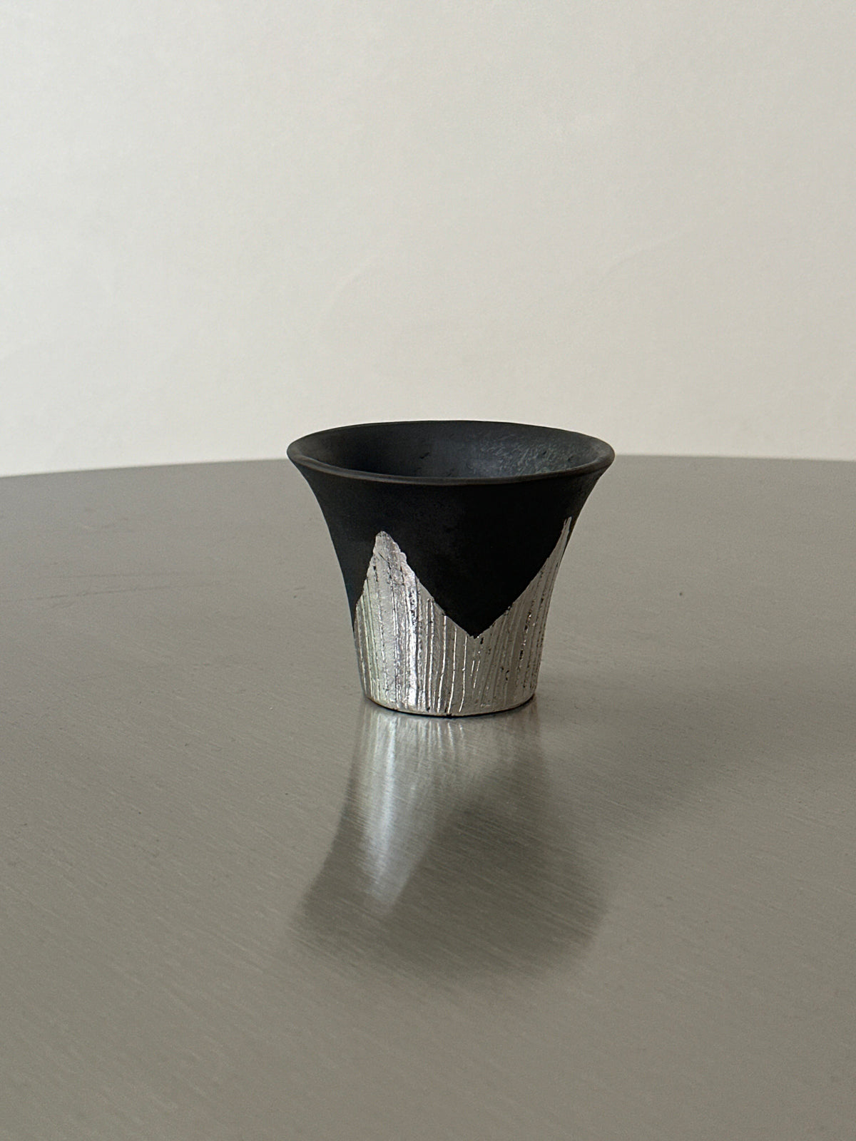 Many black pottery handmade silver-leaf snow mountain cups