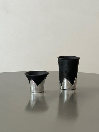 Many black pottery handmade silver-leaf snow mountain cups