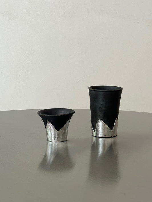 Many black pottery handmade silver-leaf snow mountain cups
