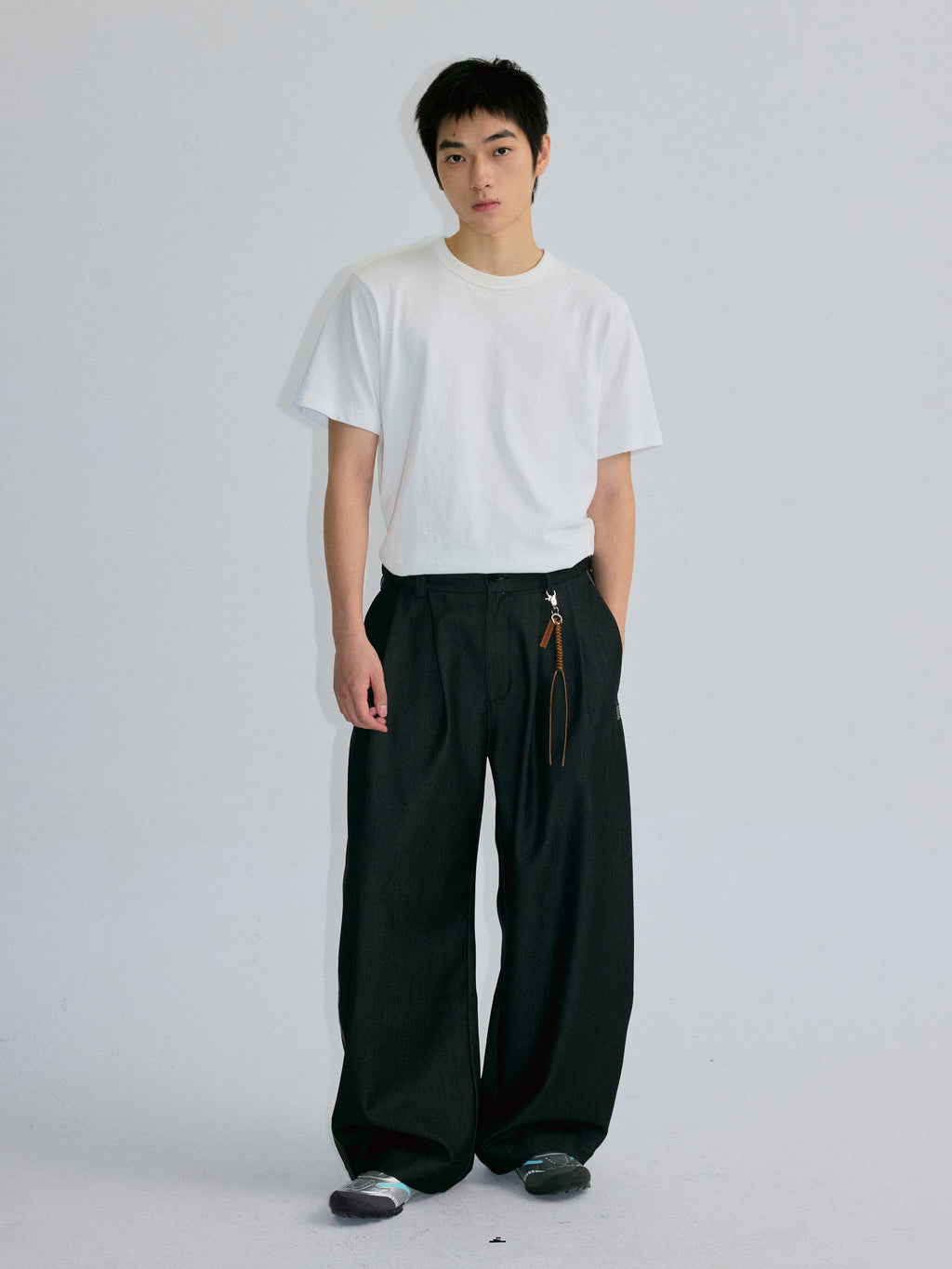 RoaringWild A Arch Roaring Beast draped wide-leg pants with scimitar design men's casual pants