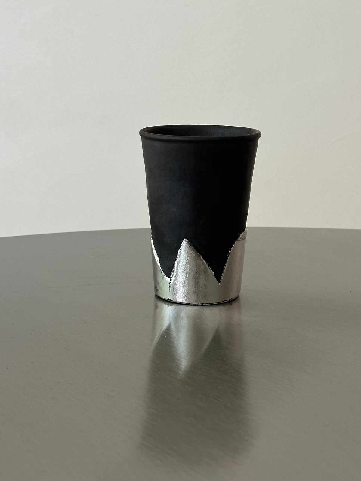 Many black pottery handmade silver-leaf snow mountain cups