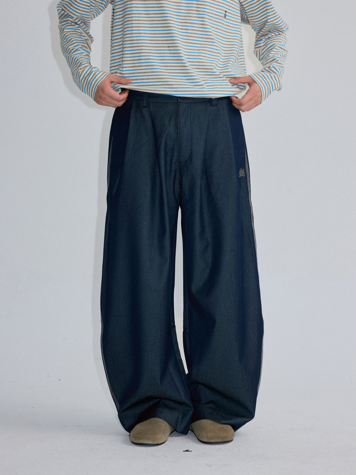 RoaringWild A Arch Roaring Beast draped wide-leg pants with scimitar design men's casual pants